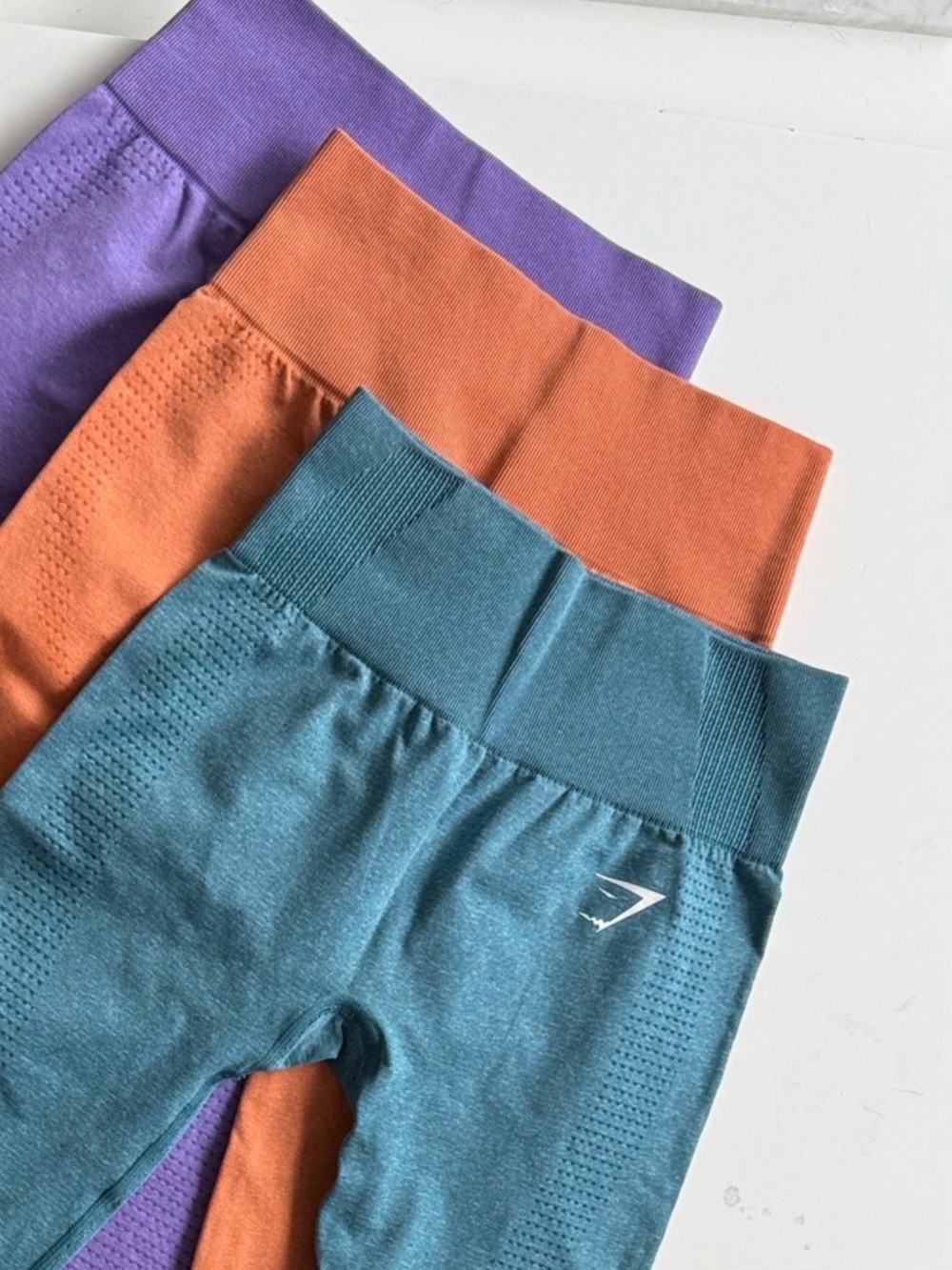 Gym shark leggings. Set of 3 Brand new 
Purple, Orange and Blue